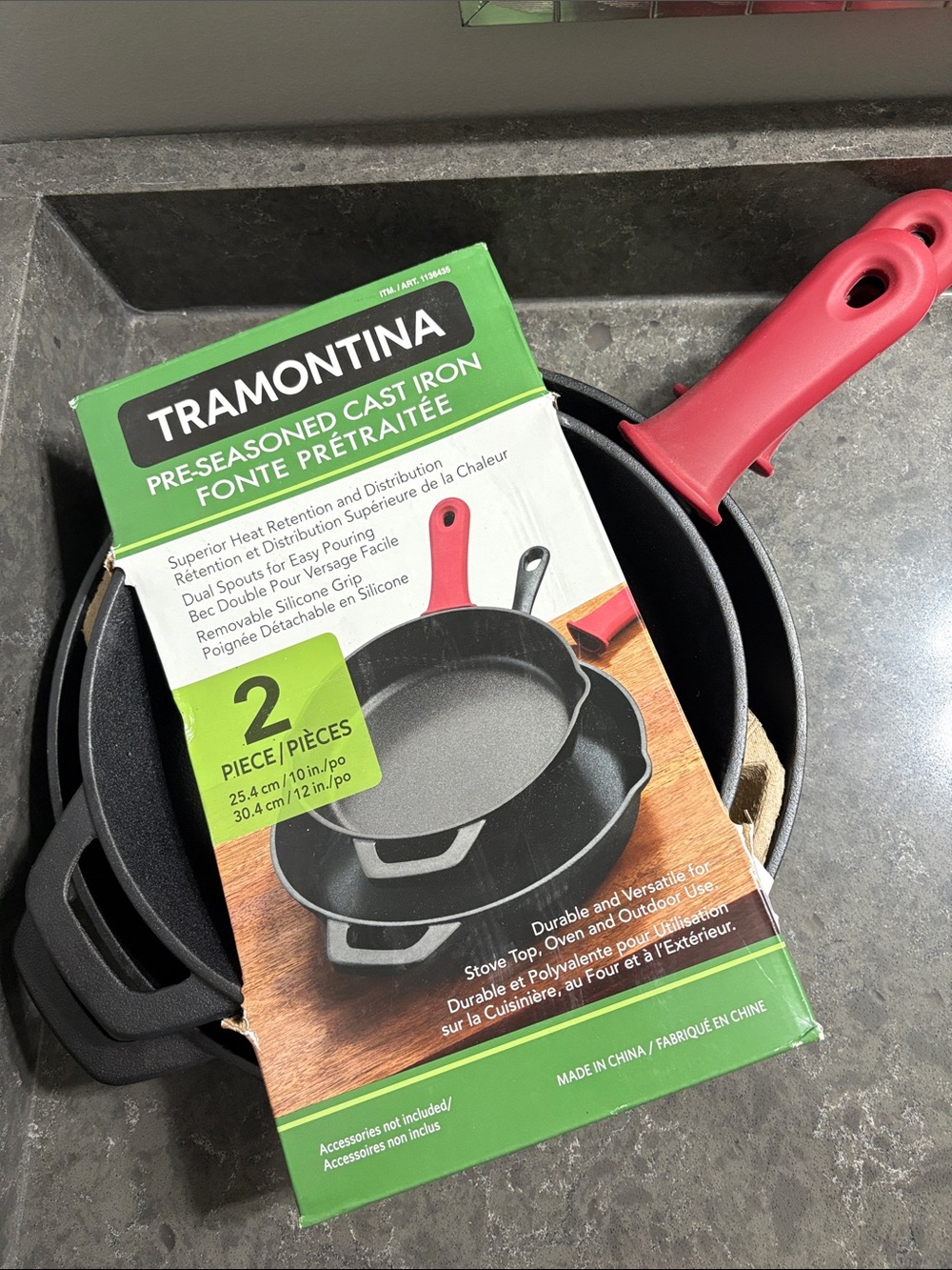 Tramontina Pre-Seasoned Cast Iron Skillet with Red Silicone Handle